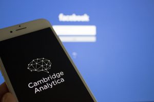 Cambridge Analytica on a device with Facebook screen